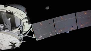 Flight Day 14: Orion's Solar Array Splits Earth and Moon